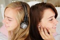 Teenage girls listening to music