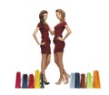 Teenage girls in red dresses with shopping bags Royalty Free Stock Photo