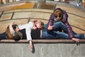 Teenage girls relaxing on a city street