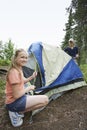 Teenage Girls Setting Tent