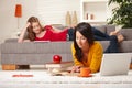 Teenage girls studying at home Royalty Free Stock Photo