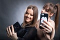 Teenage Girls Taking Selfie On Mobile Phone Royalty Free Stock Photo