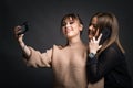 Teenage Girls Taking Selfie On Mobile Phone Royalty Free Stock Photo