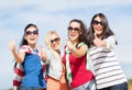 Teenage girls or young women showing thumbs up Royalty Free Stock Photo