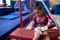 Teenage Gymnast Putting on Gymnastic Grip