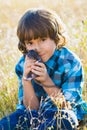 Teenage happy boy playing with rat pet outdoor Royalty Free Stock Photo