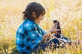 Teenage happy boy playing with rat pet outdoor Royalty Free Stock Photo