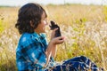 Teenage happy boy playing with rat pet outdoor Royalty Free Stock Photo