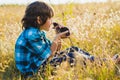 Teenage happy boy playing with rat pet outdoor Royalty Free Stock Photo