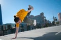 Teenage hip-hop girl dancing over city landscape Royalty Free Stock Photo