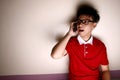 Teenage kid talking on a smartphone Royalty Free Stock Photo