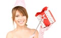 Teenage party girl with magic wand and gift box Royalty Free Stock Photo