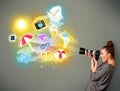 Teenage photographer making photos of holiday painted icons Royalty Free Stock Photo