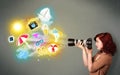 Teenage photographer making photos of holiday painted icons Royalty Free Stock Photo