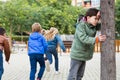 Teenage playing hide-and-go-seek in the playground