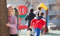 Teenage playing hide-and-go-seek in the playground