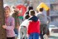 Teenage playing hide-and-go-seek in the playground