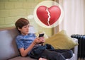 Teenage`s problem heart broken concept. A teenager boy being ignored via chat app. A boy holding mobile phone look at the screen w