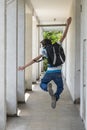 Teenage school boy with a backpack on his back walking to school Royalty Free Stock Photo