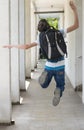 Teenage school boy with a backpack on his back walking to school Royalty Free Stock Photo
