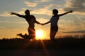 Teenage sisters, doing exercises at sunset Royalty Free Stock Photo