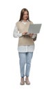 Teenage student with backpack using laptop on white background Royalty Free Stock Photo