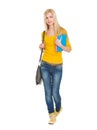 Teenage student girl with books going forward Royalty Free Stock Photo