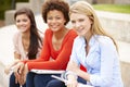 Teenage student girls working outdoors Royalty Free Stock Photo