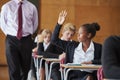 Teenage Student Sitting Examination Asking Teacher Question Royalty Free Stock Photo