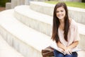 Teenage student working outdoors Royalty Free Stock Photo