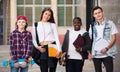 Teenage students close to university Royalty Free Stock Photo