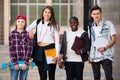 Teenage students close to university Royalty Free Stock Photo