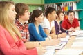 Teenage Students Studying In Classroom