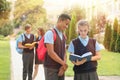 Teenage students in stylish school uniform Royalty Free Stock Photo