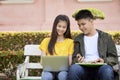 Teenage students work school job on laptop Royalty Free Stock Photo