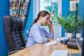 Teenage upset girl crying in front of computer screen Royalty Free Stock Photo