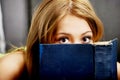 Teenage woman reading a book. Royalty Free Stock Photo
