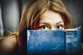 Teenage woman reading a book. Royalty Free Stock Photo