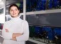 teenage wondered what breed aquarium fish to buy for themselves in aquarium shop