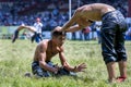 Teenage wrestlers battle for supremacy during competition at the Kirkpinar Turkish Oil Wrestling Festival in Edirne, Turkey.