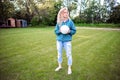 Teenaged girl outdoors with a volleyball Royalty Free Stock Photo