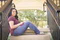 Teen Girl Sitting on Stairway Royalty Free Stock Photo