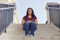 Teen Girl Sitting on Stairway Royalty Free Stock Photo