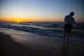 Teen with action camera on the sea. Royalty Free Stock Photo