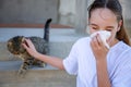 The teenager is allergic to a cat Royalty Free Stock Photo
