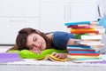 Teenager asleep by the book Royalty Free Stock Photo