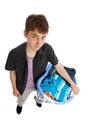 Teenager with basket of clothing