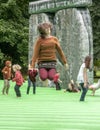 Teenager bouncing on inflatable Stonehenge