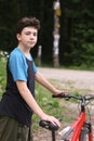 Teenager boy with bicycle Royalty Free Stock Photo