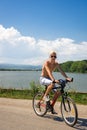 Teenager boy on bicycle on the road in nature Royalty Free Stock Photo